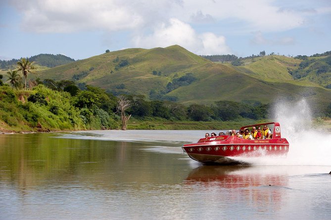 Half Day Sigatoka River Jetboat & Village Tour with Lunch & Transfers - Eating a traditional Fijian lunch